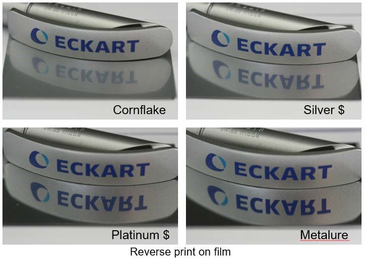 Metallic Ink Pigment Guide: Reverse print of different pigment types on film (cornflake, silver dollar, platinum dollar, METALURE (Vacuum Metallized Pigment).